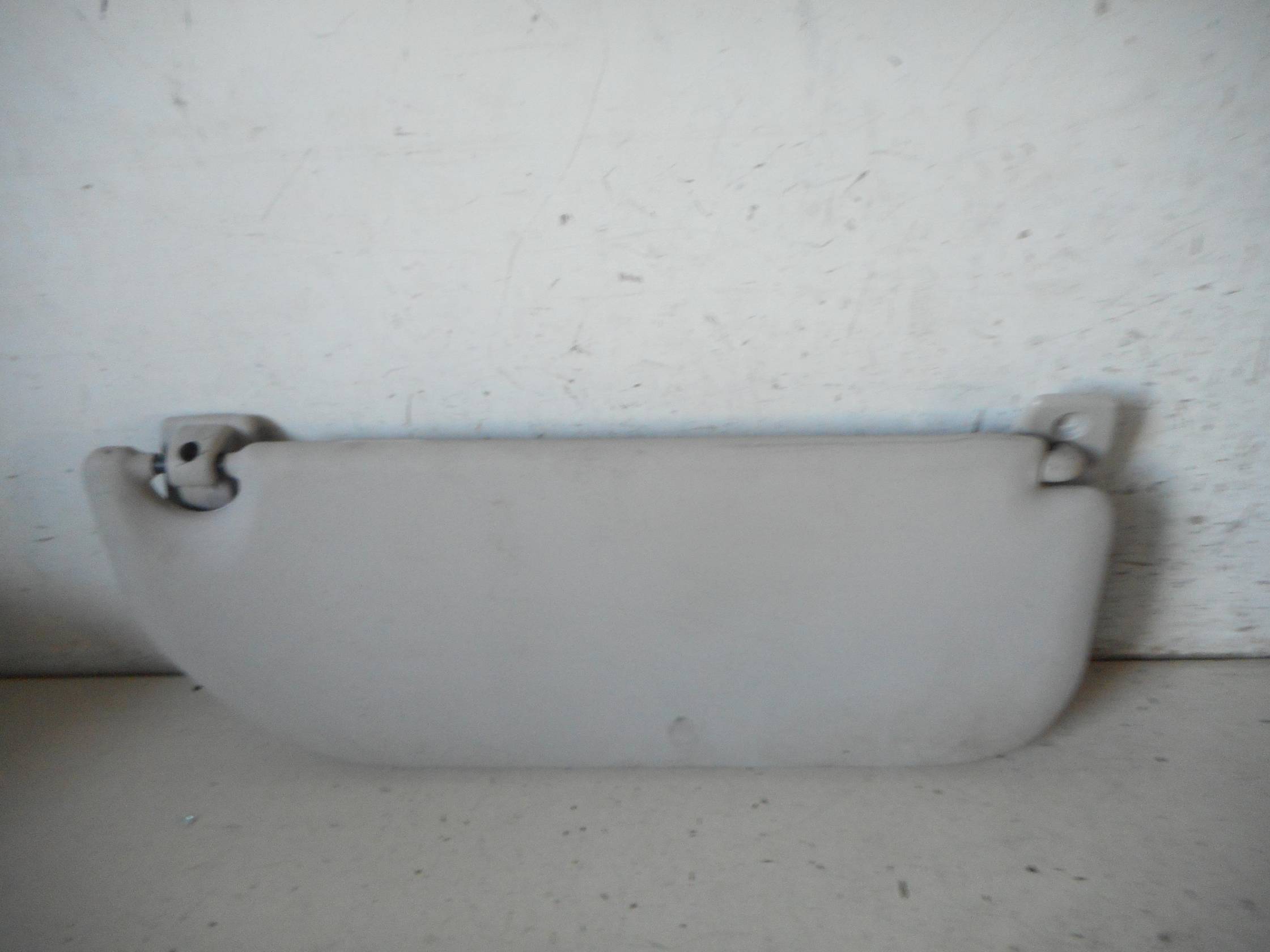 Aletta parasole parabrezza sx.